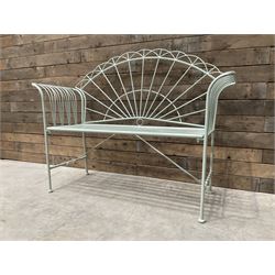 Wrought metal two seat garden bench, sunburst back, painted in pale green finish