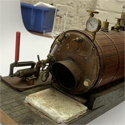 Scale built live steam model of a steam engine, planked clad and coopered copper boiler with brass pipework, manometer and water level gauge, on simulated brick wooden base L49cm H22cm