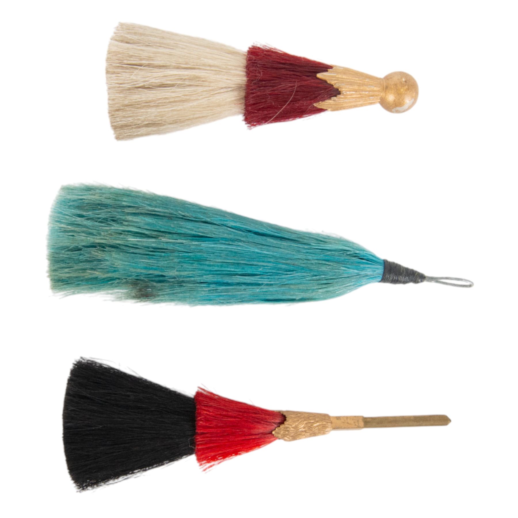 Three military plumes, comprising Irish Guard, Hussars and Rifles 