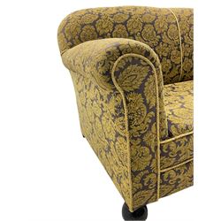20th century drop arm two seat settee, upholstered in repeating foliate pattern fabric, staggered mechanism with metal handle