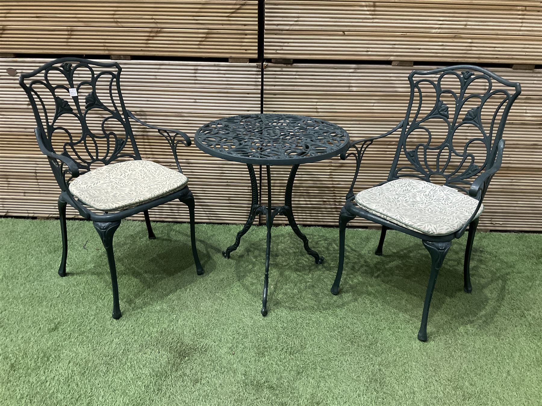 Aluminium  garden table and two chairs painted in green - THIS LOT IS TO BE COLLECTED BY APPOINTMENT FROM DUGGLEBY STORAGE, GREAT HILL, EASTFIELD, SCARBOROUGH, YO11 3TX