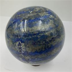 Lapis lazuli sphere upon a carved wooden base 