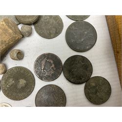 Collection of metal detecting finds and antiquities, housed on five display boards and some loose, to include coins, keys, axe head etc 