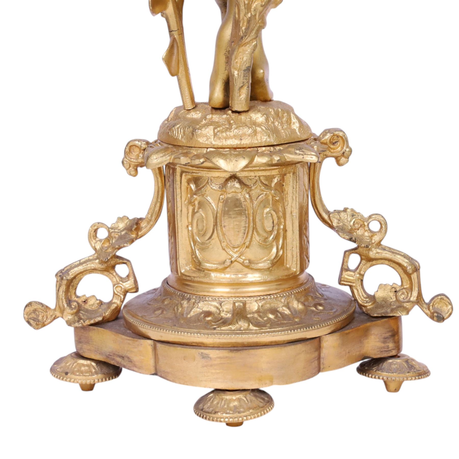 Pair of 19th century ormolu putto figures, each modelled stood with foliate support to backs, upon a naturalistic base upon cylindrical plinth each with twin leafy tendril supports, each plinth with inset Sevres type painted panel of a cherub, upon a shaped base with four compressed disk feet, the front facing with leaf mount, H29cm