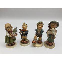 Twenty six Hummel figures by Goebel, to include Fire Fighter, Band Leader and Spring Sowing