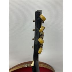 Early 20th century Italian Rafaele Disantino eight-string mandolin with two-piece back and spruce top with stamped Rafaele Disantino signature; bears maker's label L61cm; in wooden carrying case