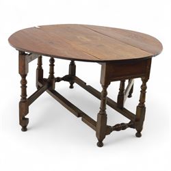 Early 19th century oak drop-leaf gateleg table, oval top above plain frieze, on ring turned legs joined by stretchers
