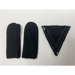 Collection of eleven German metal and cloth badges and uniform buttons including driver's badge, two 'SS' fabric skulls, private's shoulder tabs, Police cloth badge, tank destruction badge, medal bars and ribbon etc; most WW2 period