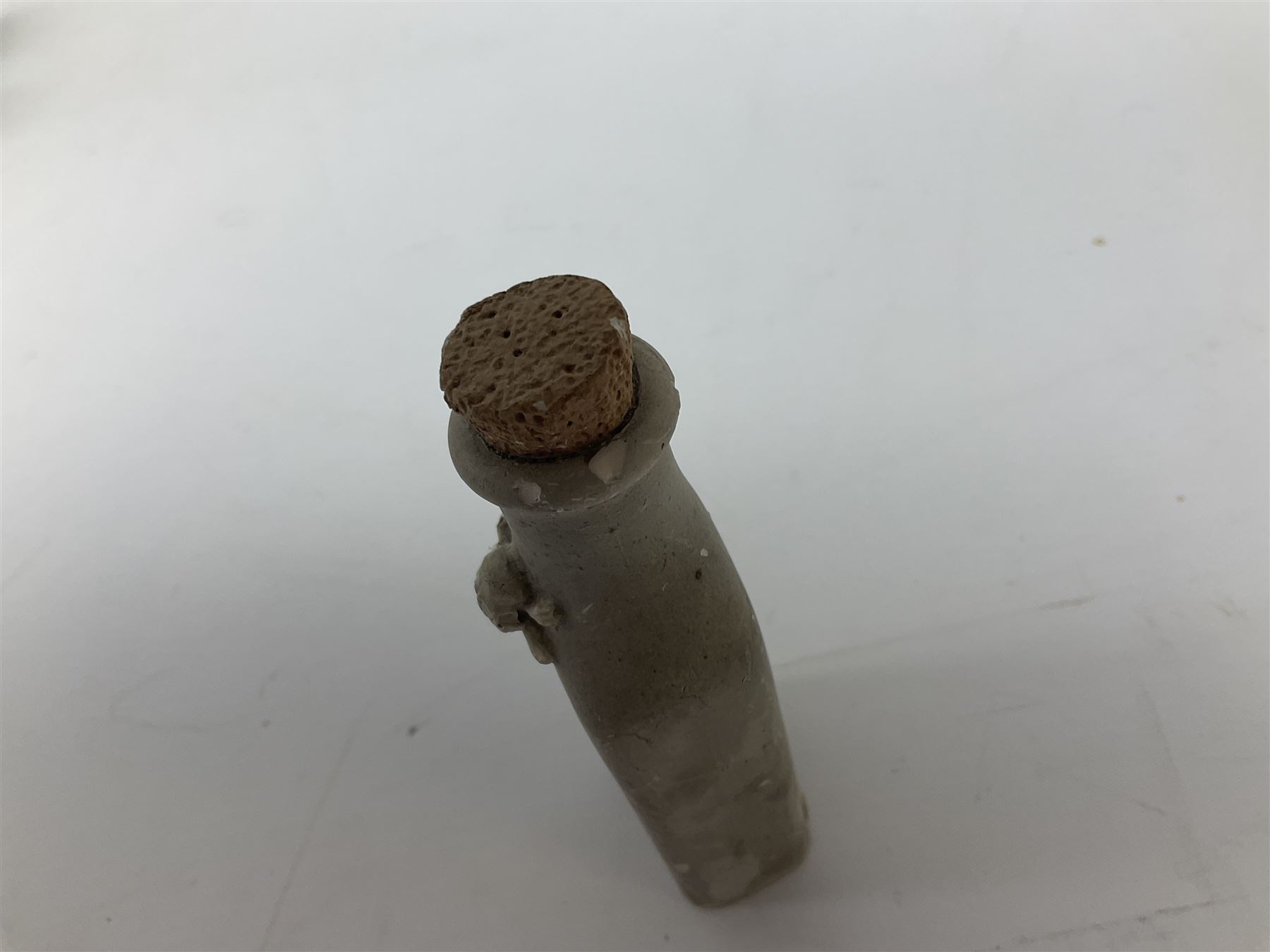 Terry Pratchett Discworld figures, designed by Clarecraft, comprising Cohen the barbarian, DW42, the Patrician, boxed, DW37, three Potions, DW18, DW19, DW20, two Death Bookstamps, DW50, the Gods Dice Box, boxed, DW26, together with two Discworld newsletters, volume 5, August 1998 and volume 6, August 1999. 