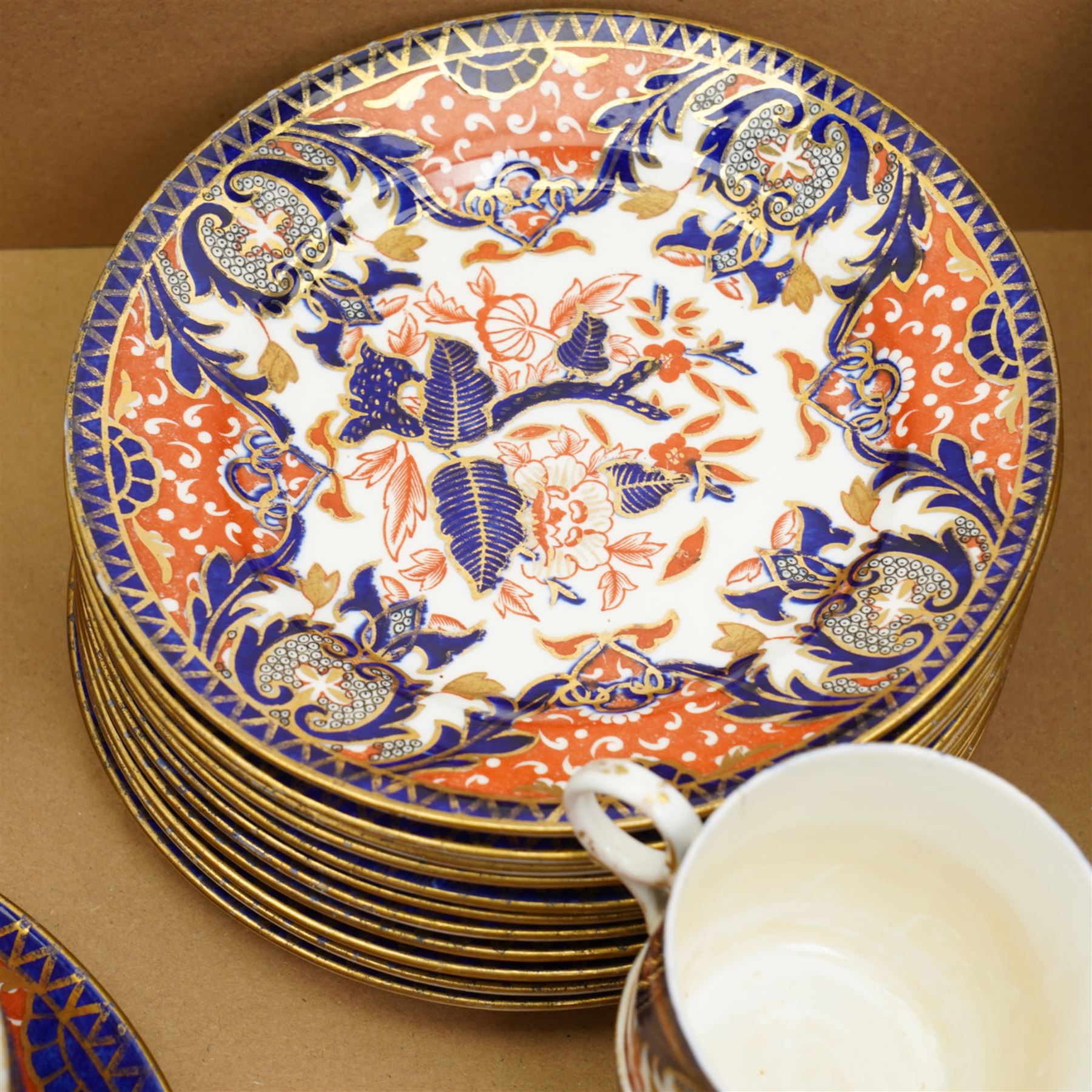 Victorian Samuel Radford Imari pattern part tea service, comprising eleven saucers, eleven cake plates, etc 