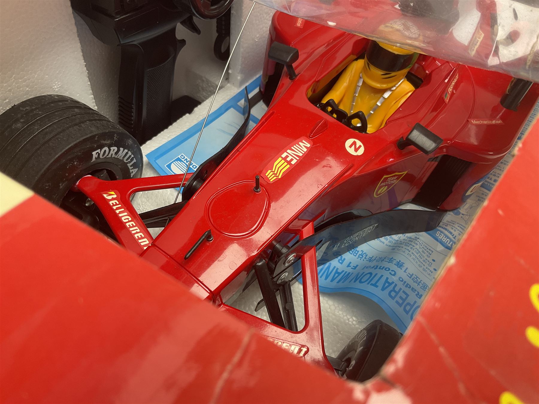 PMS Lightning 1:8 scale remote control racing car; Soma Sonic Man battery operated electronic sounds and light action figure; and CGL Galaxy Invader 10000 computer space battle game; all boxed (3)