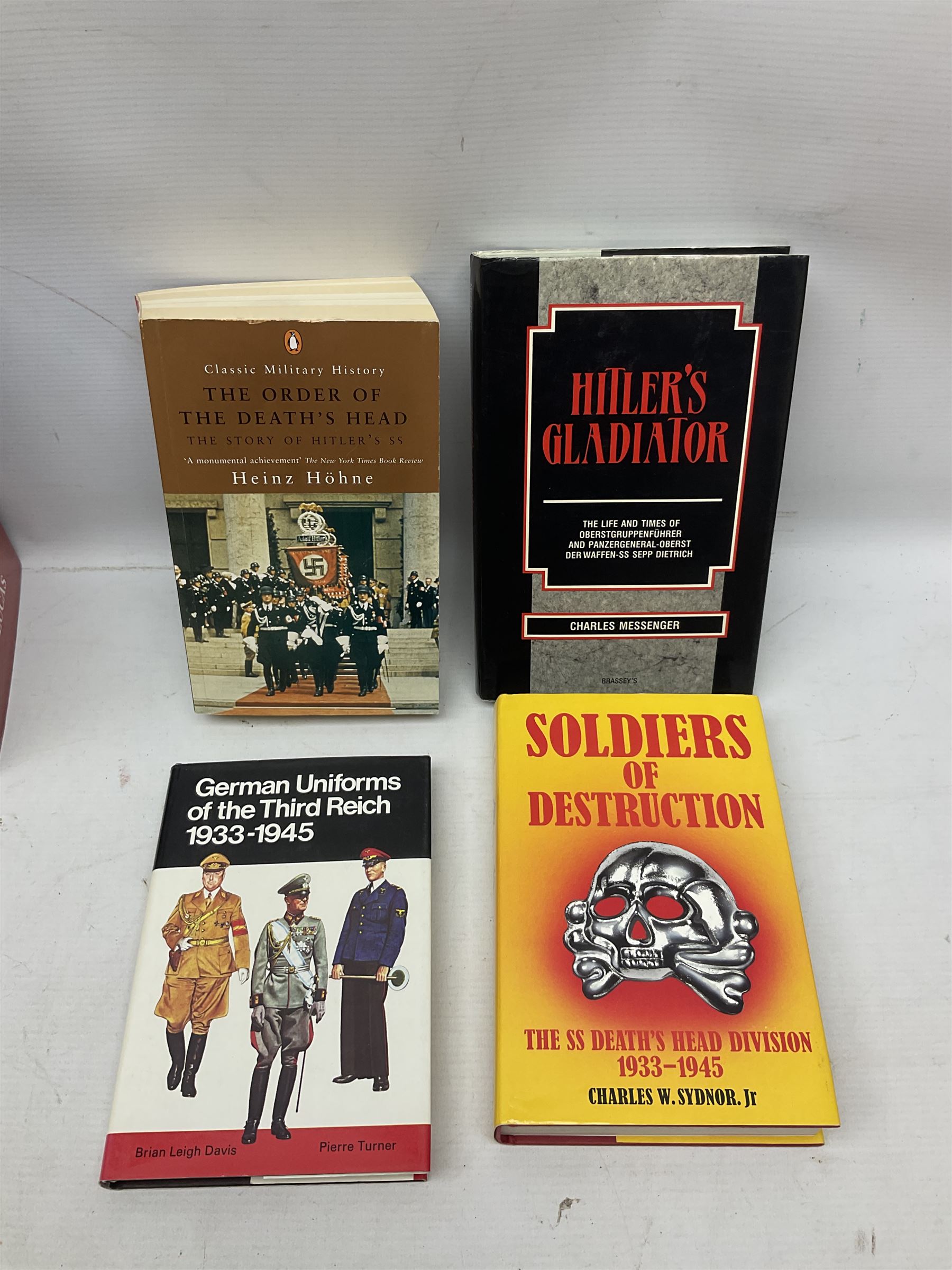 Twenty-six books of WW2 German interest with particular emphasis on the 'SS', including Charles Sydnor: Soldiers of Destruction; G.S. Graber: History of the 'SS'; Bruce Quarrie: Hitler's Samurai; David Cesarini: Eichmann - His Life and Crimes; collector's reference books etc (26)