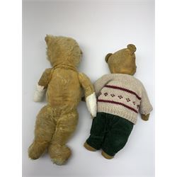Five English teddy bears c1930s-50s including wood wool filled Chiltern bear with swivel jointed head, glass eyes, plastic dog type nose, inoperative musical movement and jointed limbs with velvet pads H16.5