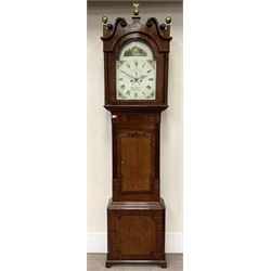 Early 19th century oak and mahogany longcase clock, the hood with scrolled pediment over stepped arch glazed door, multi-cusped and pointed arch trunk door flanked by two reeded square columns, the enamel painted dial decorated with floral spandrels and Country House scene, signed 'Jos.h (Joseph) Churton, Whitchurch', eight-day movement striking on bell