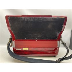 Clinkscale Crucianelli piano accordion in red pearline case with one-hundred and twenty buttons and forty-one keys L52cm; in carrying case