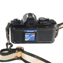 Two Nikon FM camera bodies, comprising Nikon FM serial no. 3239117, with a Nikon Series E 36-72mm 1:3.5 zoom lens and a Nikon FM2 serial no. 7141741, with a Nikkor 50mm 1:1.8 lens and a Nikon Series E 70-210mm 1:4 zoom lens