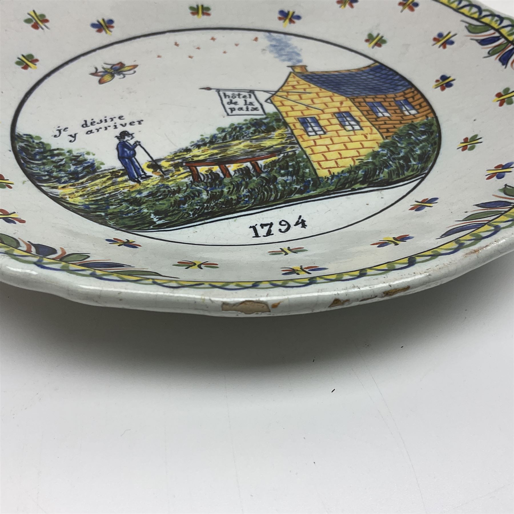 Four French Faience plates, comprising Je suis las de le porter, Le malheur nous reunit, Je desire y arriver and Eveque de Meaux, D24cm  