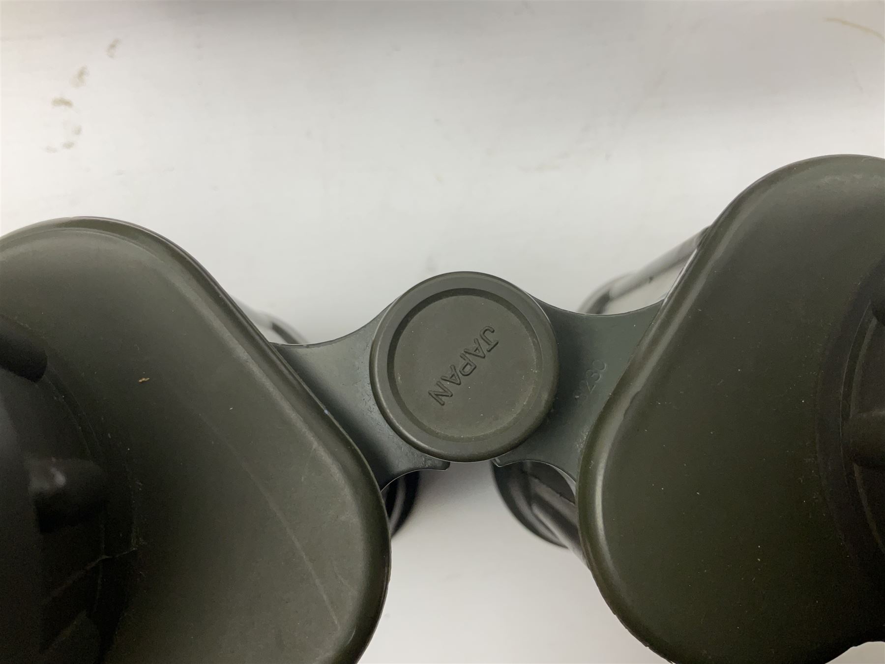 Eleven pairs of binoculars to include Lieberman & Gortz 20x65, Stem (USSR) 7x50, Helios 10x50 Field, Prinz 12x50, Tasco 8x40, Tasco 10x50, etc