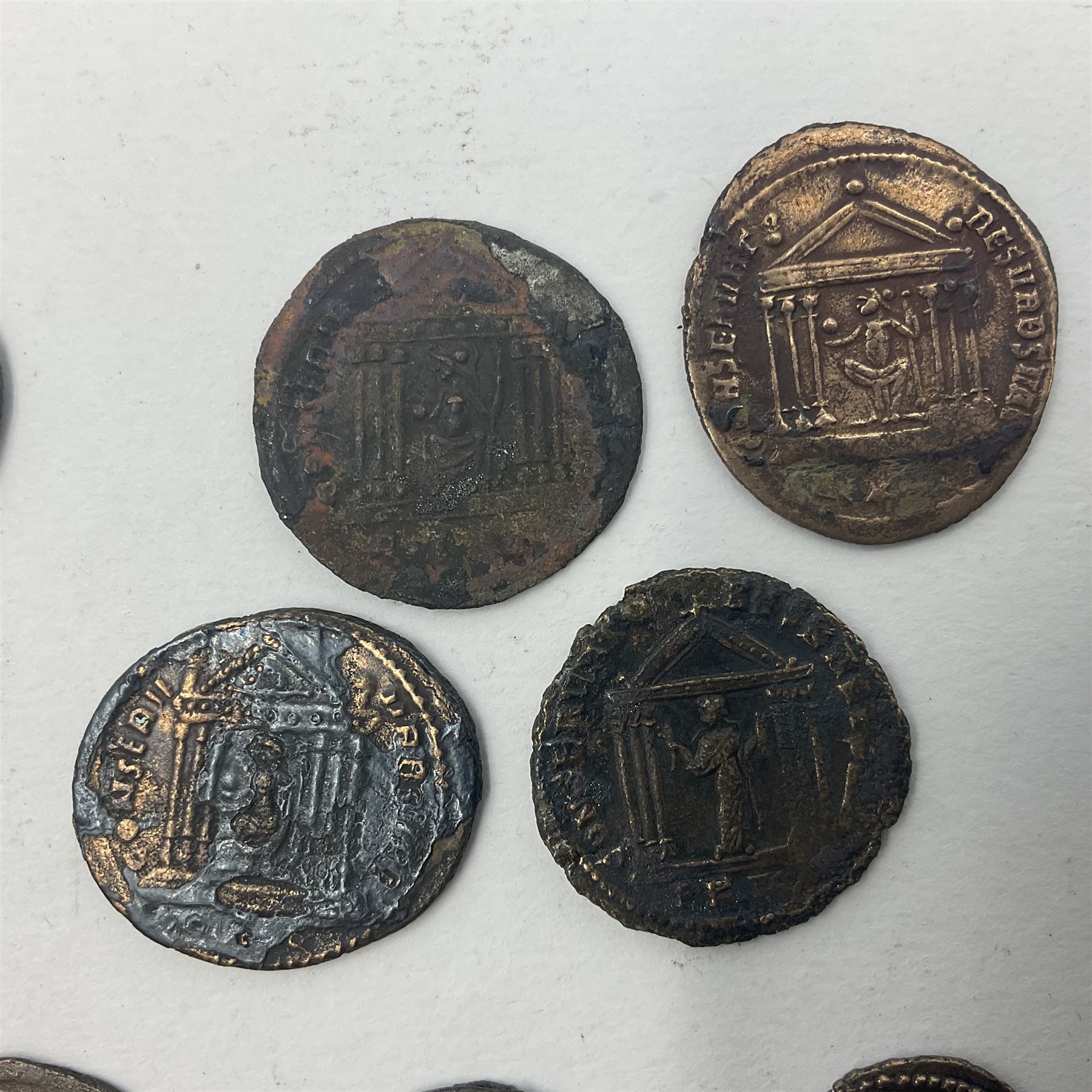 Roman Imperial Coinage, Maxentius (AD 306-312), fourteen bronze folles, most bearing rev. Roma seated in temple holding globe and sceptre (14)