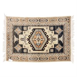 Two rugs, small Bokhara-type rug, terracotta ground with repeating hooked lozenge medallions enclosed by geometric borders (H 120cm, W 83cm); and a cream-ground rug, central lozenge medallion with geometric spandrels and border motifs (H 145cm, W 101cm),