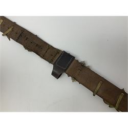Scout's leather belt mounted with fifteen military cap/glengarry badges including Highland Light Infantry, Royal Marines, RA, RASC, Kings Own, West Riding Regiment etc; WW2 British Army sidecap dated 1941; pair of spats; two pairs of Home Guard cloth shoulder titles etc