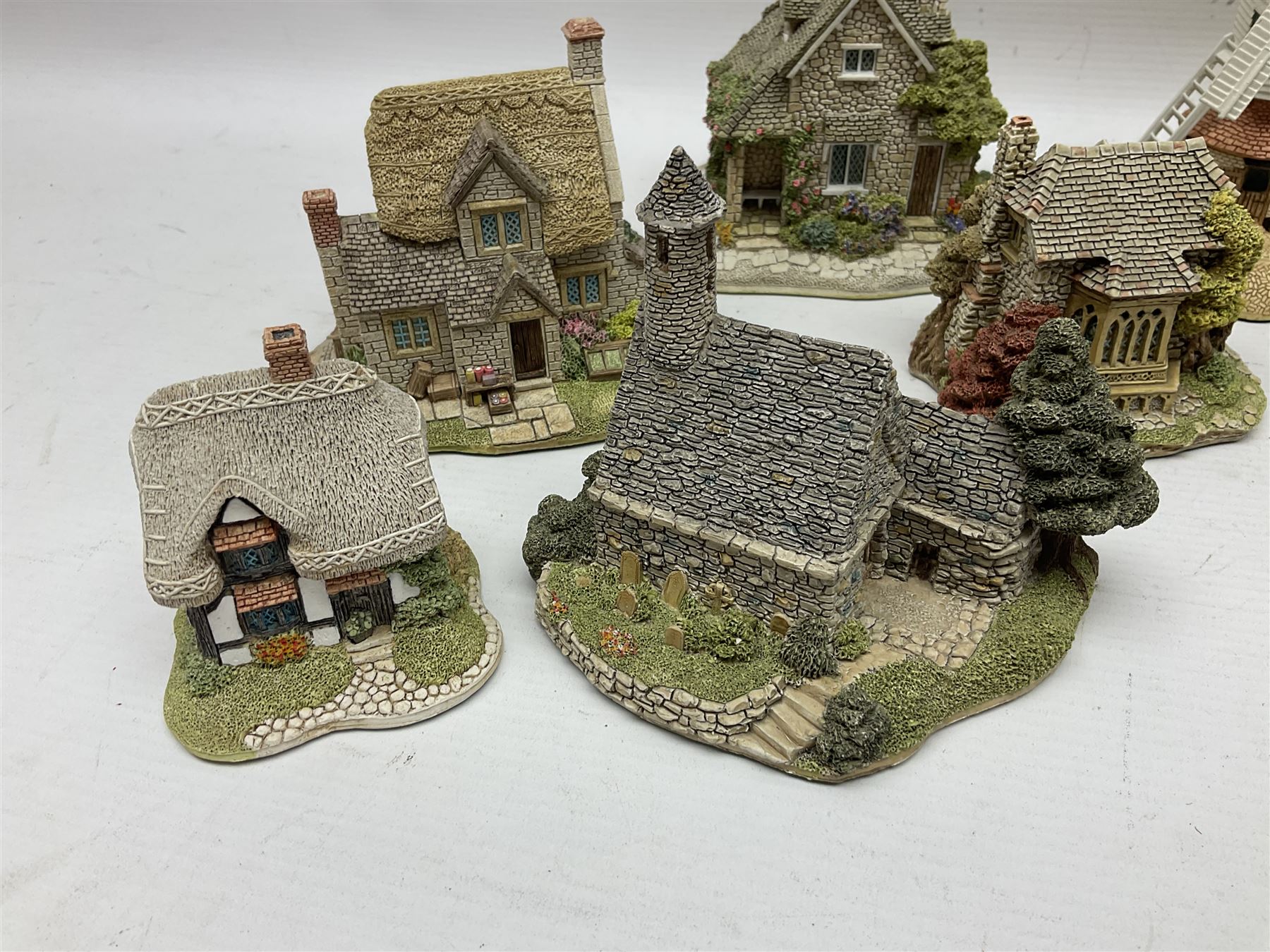 Twenty Lilliput Lanes, including The Chocolate House, Chiltern Mill, Blaise Hamlet, St Kevin Church, some with deeds and original boxes