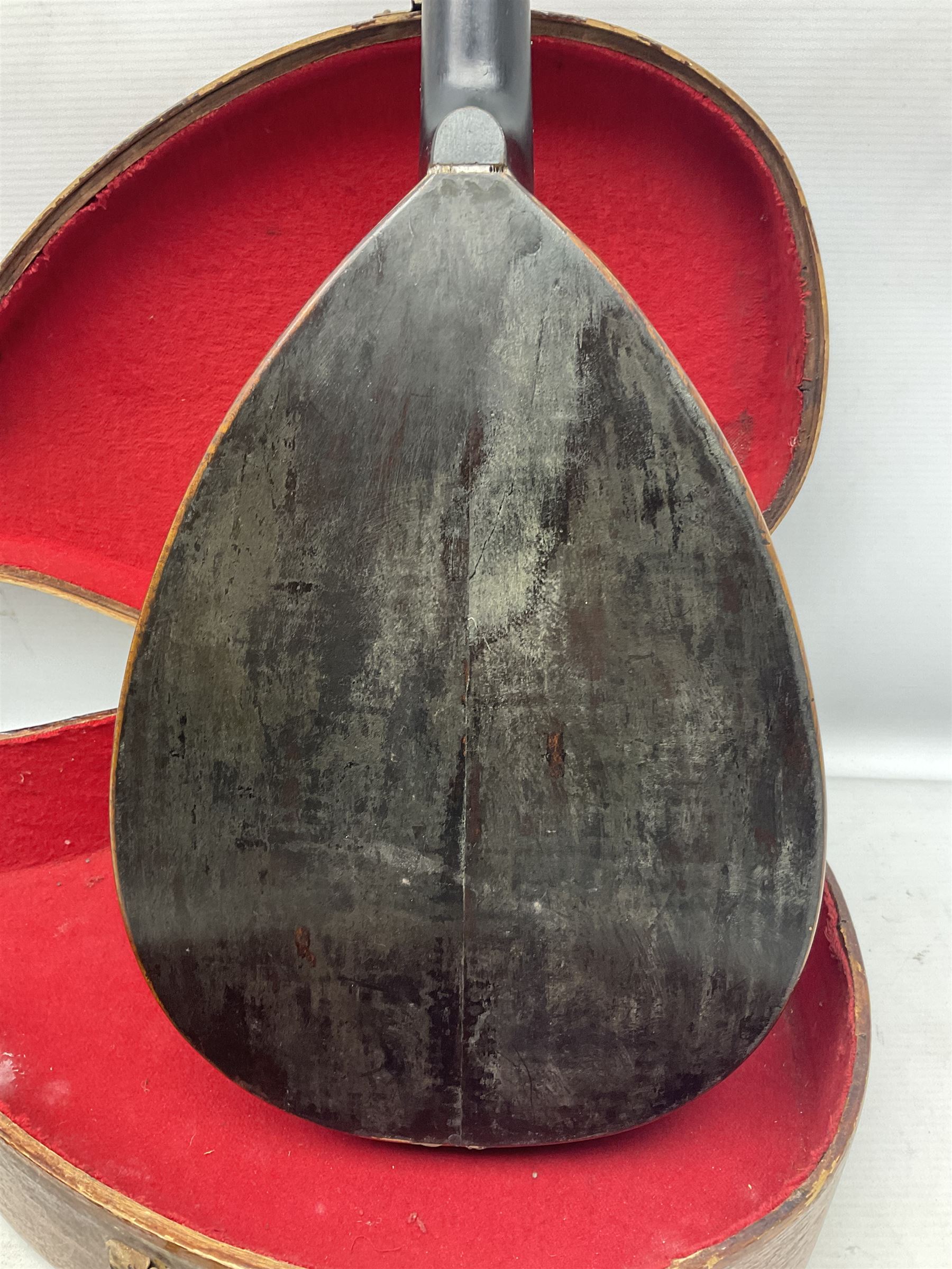 Early 20th century Italian Rafaele Disantino eight-string mandolin with two-piece back and spruce top with stamped Rafaele Disantino signature; bears maker's label L61cm; in wooden carrying case