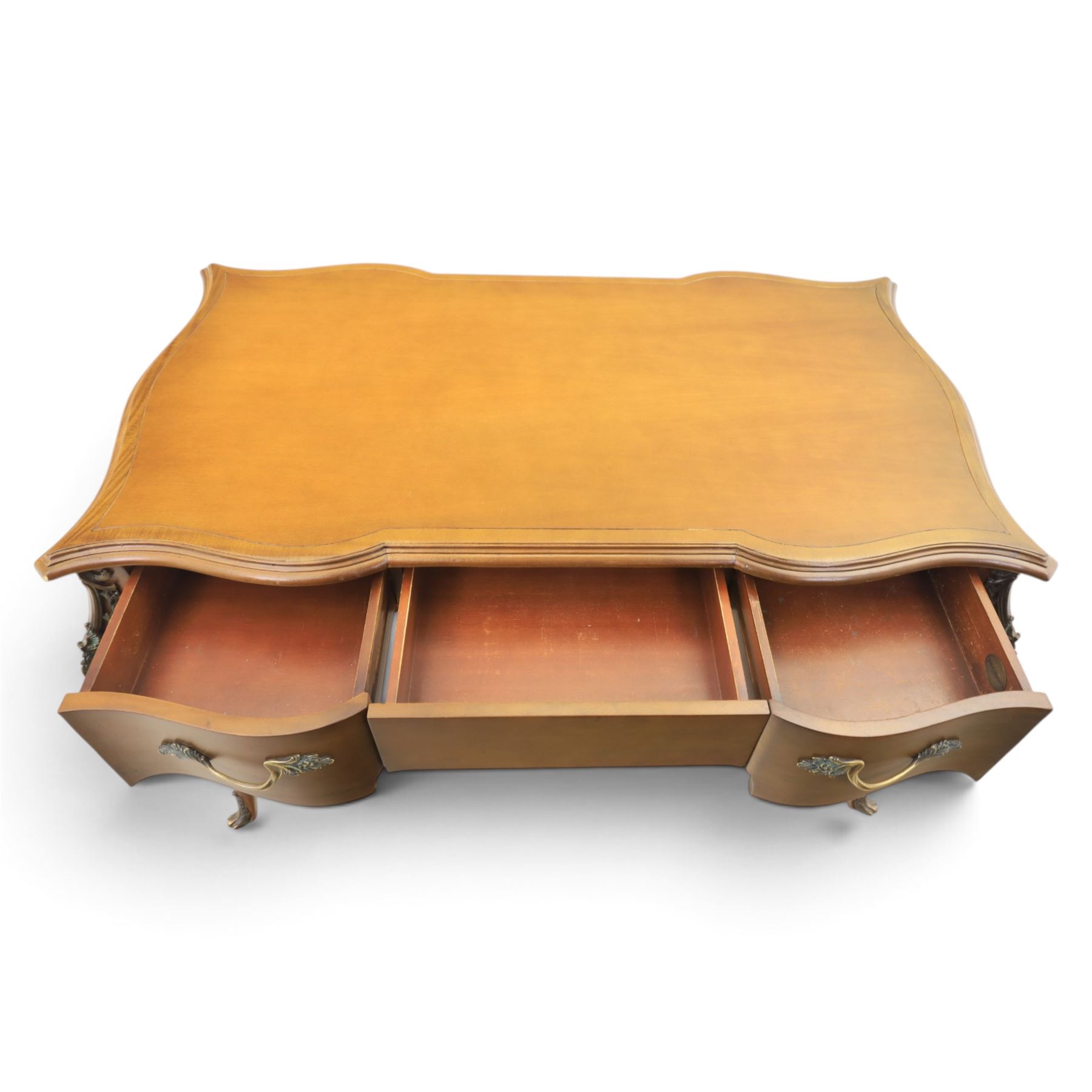And So To Bed - Cherrywood serpentine dressing table, two drawers with brass handles foliate design with applied gilt mounts, raised on cabriole legs with gilt caps