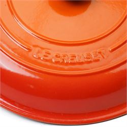 Le Creuset oval casserole dish and cover,  and another shallow example, in the Volcanic colourway