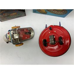 Seven modern Chinese, Japanese and Continental boxed tin-plate toys including Ucan Daire Flying Saucer, Drumming Animal, Circus Clown, Puzzle Cat, Bird with Jumping Action etc; and a quantity of clockwork toy keys (7)