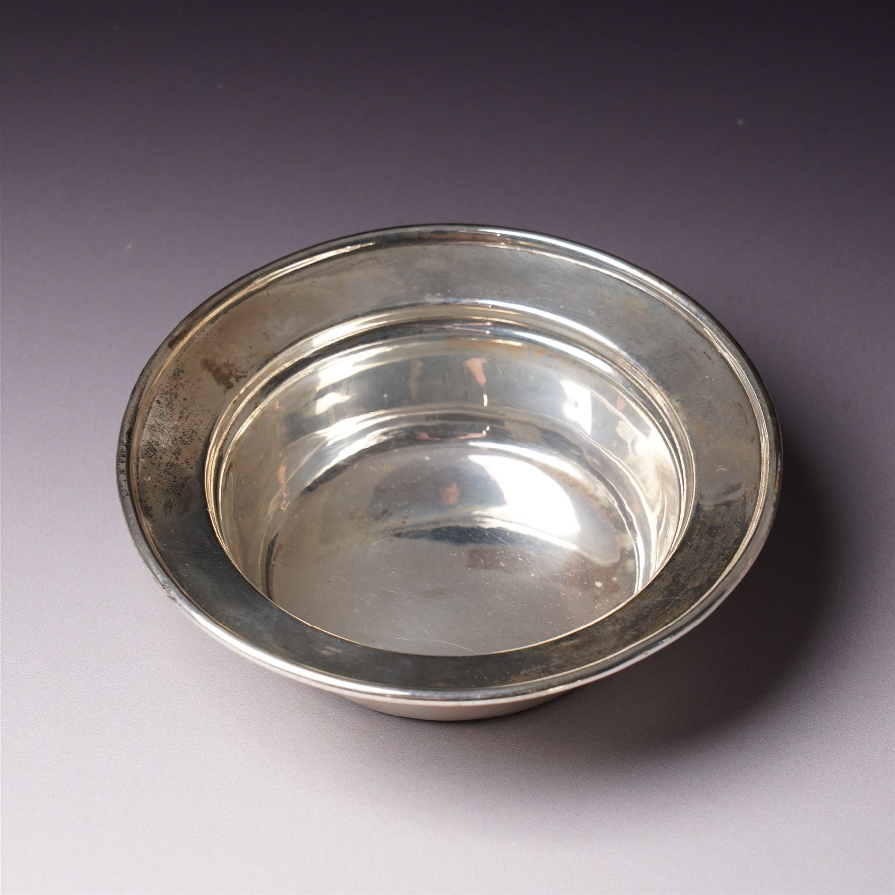 Edwardian silver two handled double lipped sauce boat Chester 1905 Maker Stokes & Ireland Ltd and a silver bowl D12cm Sheffield 1910 