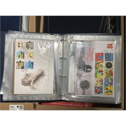 Approximately one hundred and fifteen Royal Mint coin covers, in two ring binder folders and loose, together with approximately 53 grams of Great British pre-1920 and approximately 68 grams of Great British pre-1947 silver threepence coins, and a small quantity of further pre-decimal coins