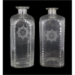 Pair of early 19th century square section decanters, with oval faceted borders and engraved sun burst panels initialled 'H' and 'R', H20.5cm