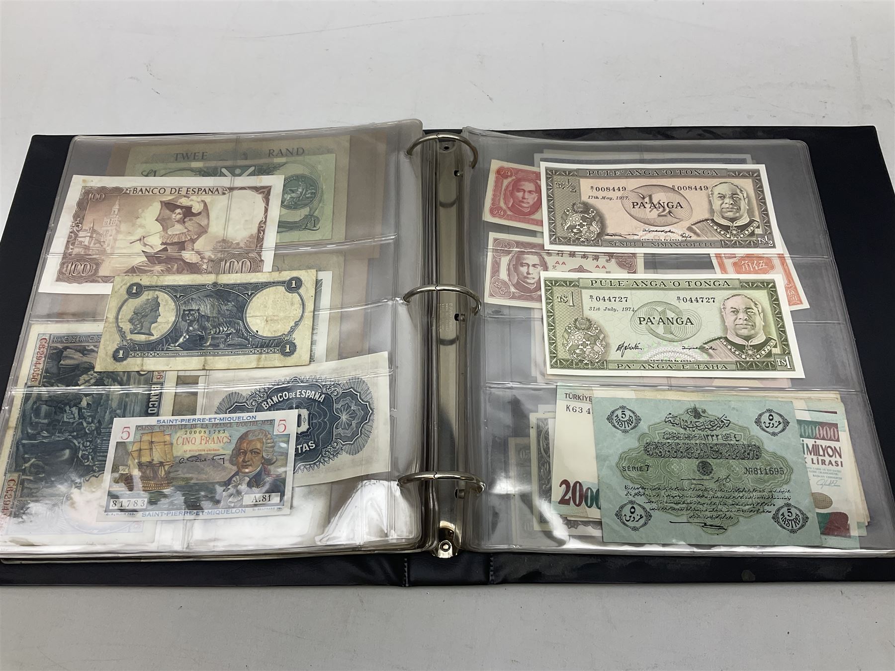 World banknotes, including Queen Elizabeth II The States of Jersey one pound 'DB202703', five pounds 'BB527762' and ten pounds 'AB651481', reserve bank of New Zealand two dollars '1L3 741894', King George V Straits Settlements one dollar 1st January 1935 'F/83 28924', various Bank of England notes etc, housed in two ring binder albums