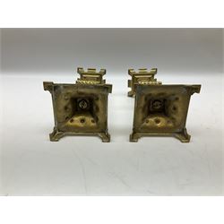 Pair of Victorian Gothic Revival brass candlesticks, in the Burges taste, with castellated tops, H21.5cm 