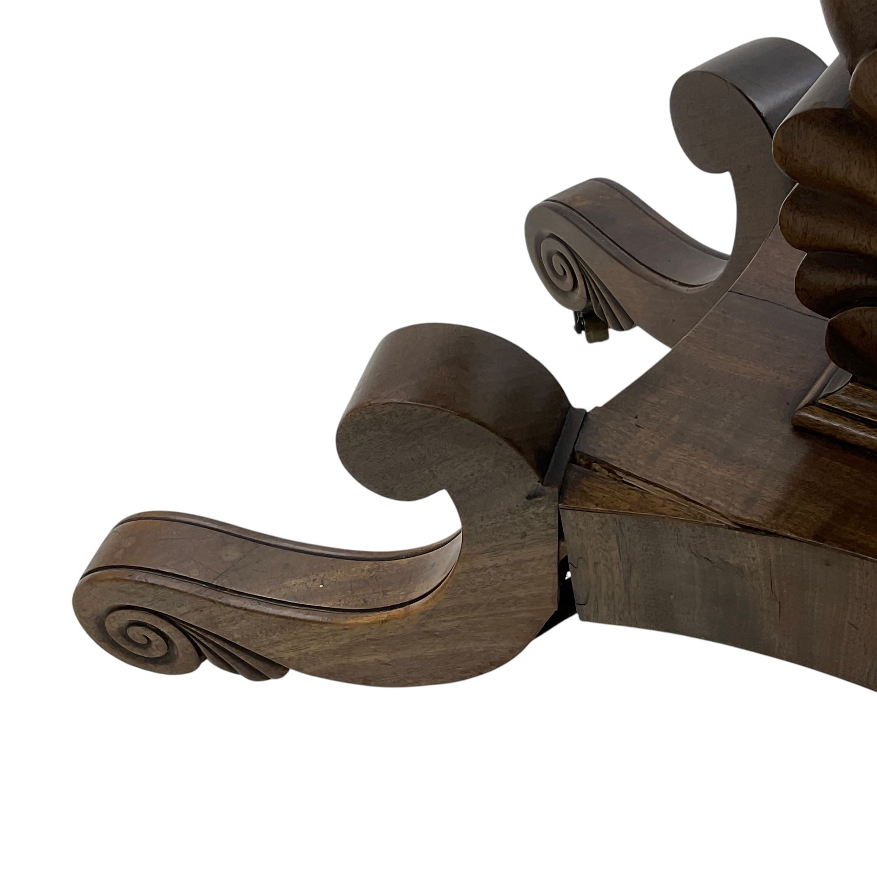 19th century mahogany tea table, fold-over swivel rectangular top with rounded corners, the frieze decorated with carved leaf motifs and applied beading, lyre shaped support on carved anthemion, rectangular platform on four out-splayed S-scroll supports with brass castors 