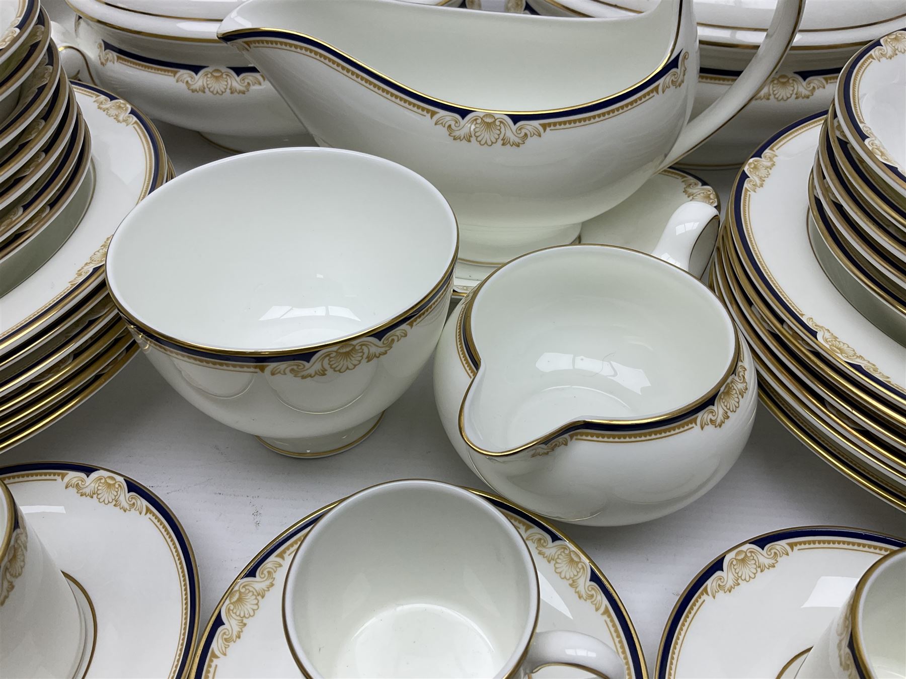 Wedgwood Cavendish pattern dinner service for twelve, comprising dinner plates, side plates, bowls, soup bowls, two tureens, saucer boat and sauce, together with matching part coffee service (82) 