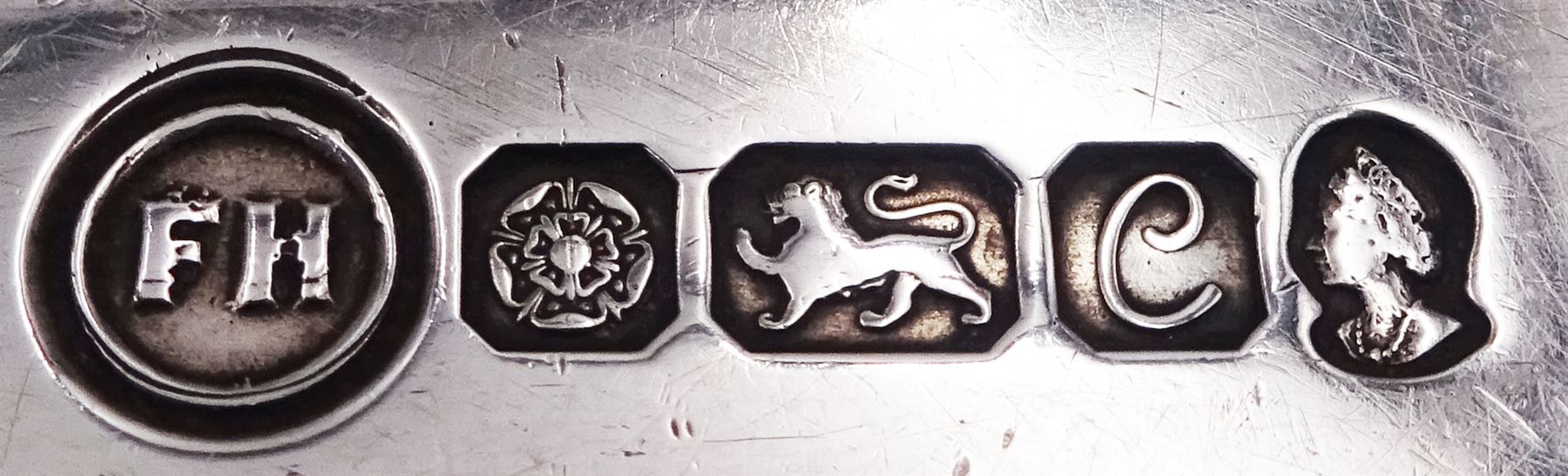 Modern silver letter opener with ring terminal, hallmarked Francis Howard Ltd, Sheffield 1977, L21.3cm, together with a modern silver money clip, of plain typical form, hallmarked W I Broadway & Co, Birmingham 2015, L5cm, each with maker's box, approximate total silver weight 2.45 ozt (76.2 grams)