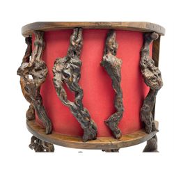 Mid-20th century French grapevine and walnut bow-front wine tasting bar, the curved counter top supported by sculptural grapevine roots, fitted with single shelf and raised on rustic vine feet (W100cm H101cm); with a pair of matching bar stools, the circular top raised on three gnarled root supports united by stretchers (W50cm H70cm)