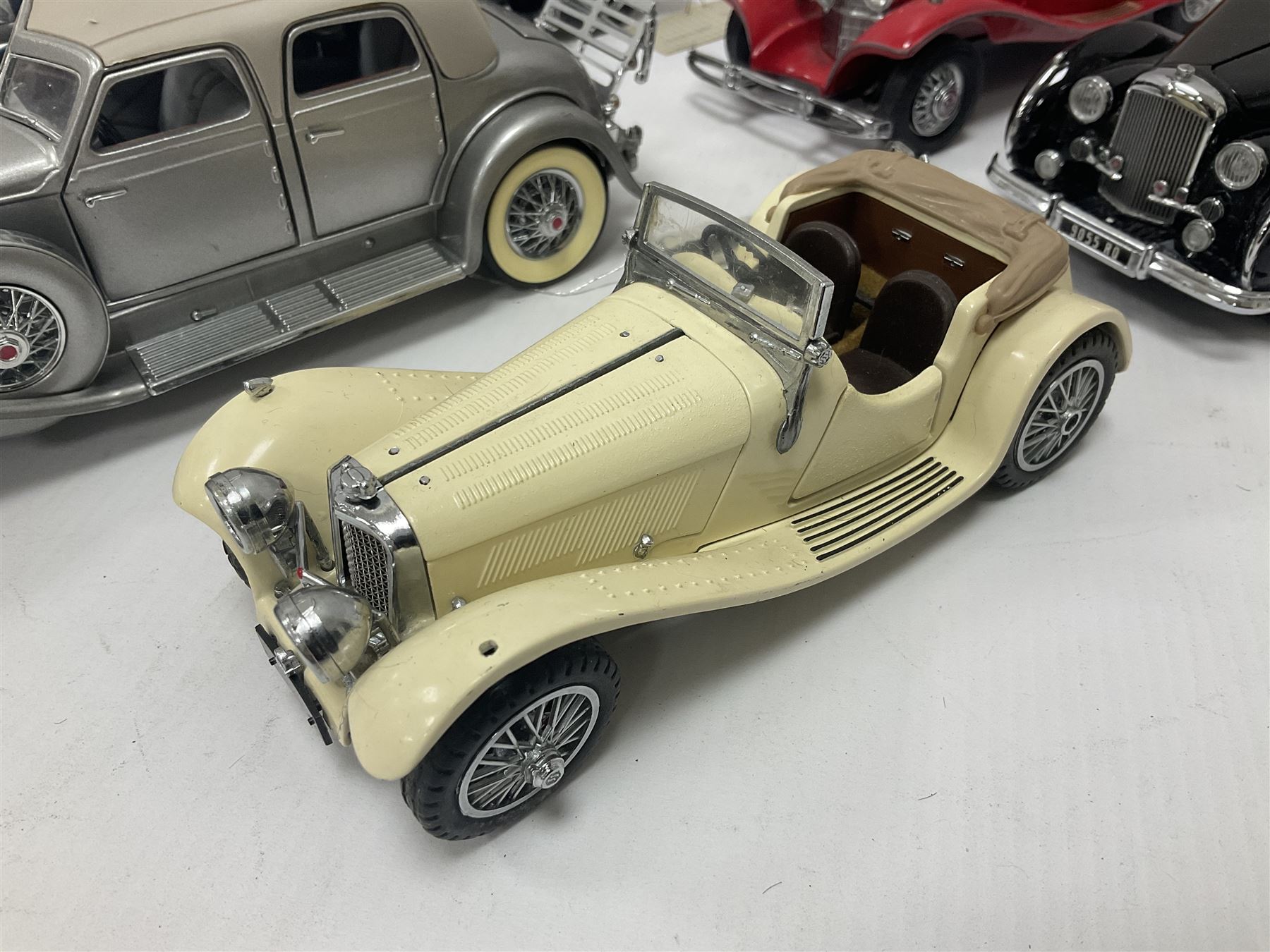 Franklin Mint - five 1:24 scale die-cast precision models comprising 1930 Bugatti Royale Coupe Napoleon, 1933 Duesenberg SJ Twenty Grand, 1935 Mercedes Benz 500K Special Roadster, 1938 Jaguar SS-100, and 1947 Bentley 