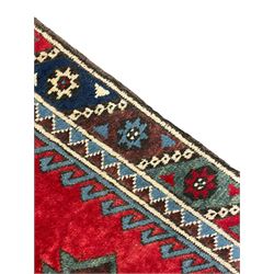 Turkish red ground runner, seven star and leaf decorated medallions, geometric design repeating border