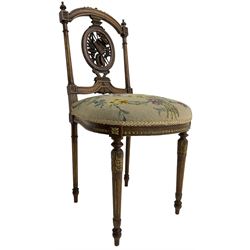 Late Victorian walnut side chair, arched cresting rail over carved and pierced splat depicting baskets and foliage, floral needle work upholstered seat, on acanthus carved and fluted turned supports