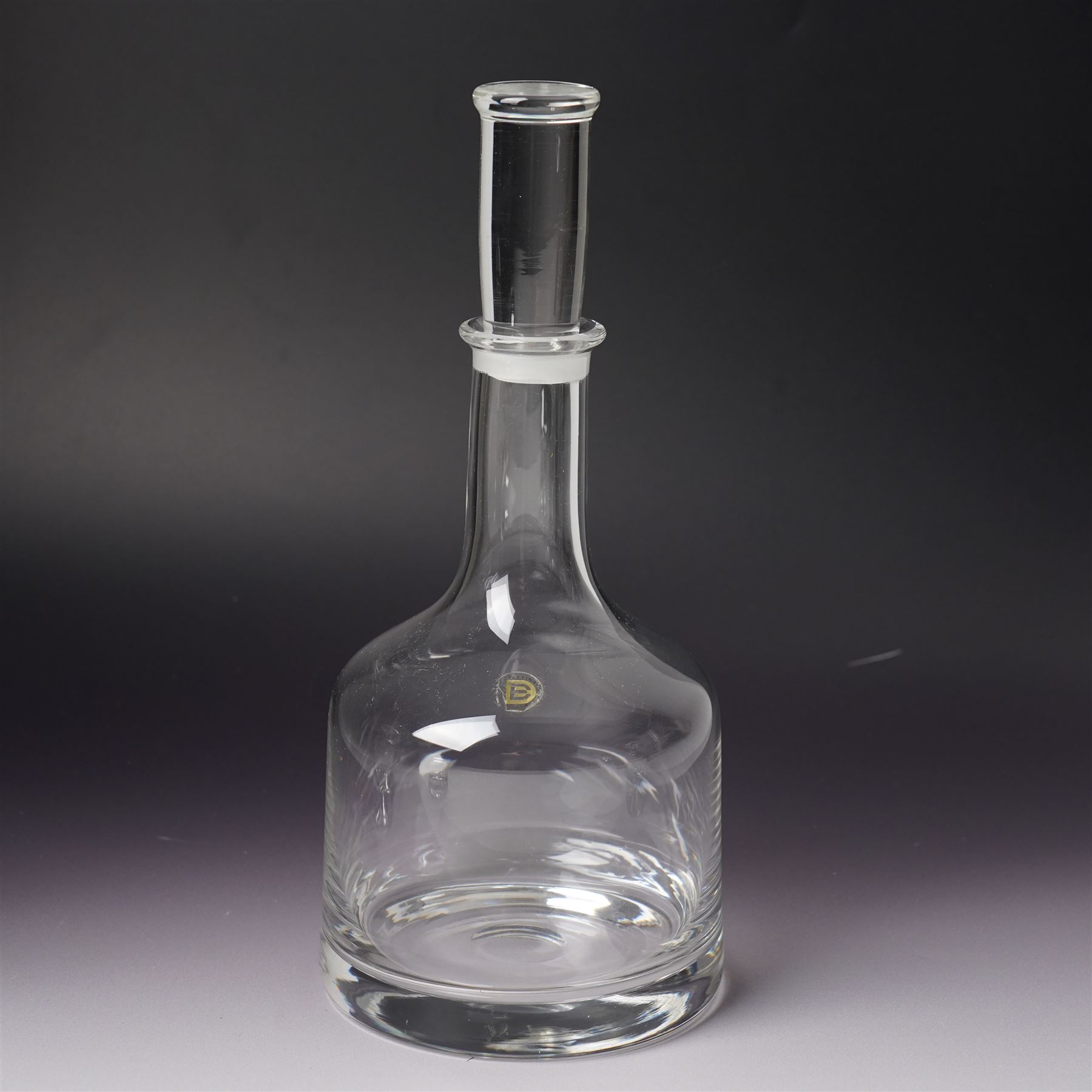 Three Dartington Crystal examples designed by Frank Thrower, comprising two oils and vinegar bottles, and one decanter, together with a covered jar with spoon designed by Palona Picasso for Villeroy & Boch, all boxed (3)