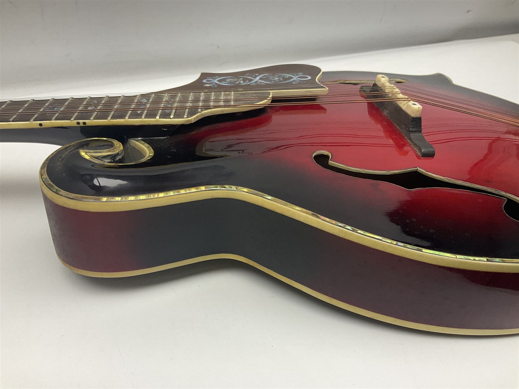 Eastern eight-string mandolin with red sunburst finish and mother-of-pearl inlay of eagles, clouds, trees etc L86cm; in fitted hard carrying case