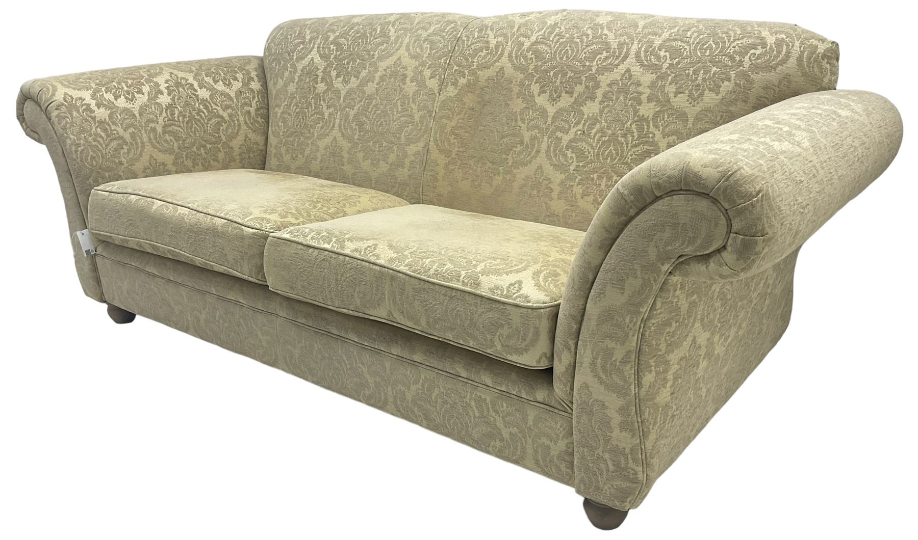 Traditional design three-piece lounge suite - three-seat sofa (W220cm, H90cm, D90cm); two armchairs (W115cm); and two footstools (77cm x 43cm, H31cm); upholstered in cream damask fabric