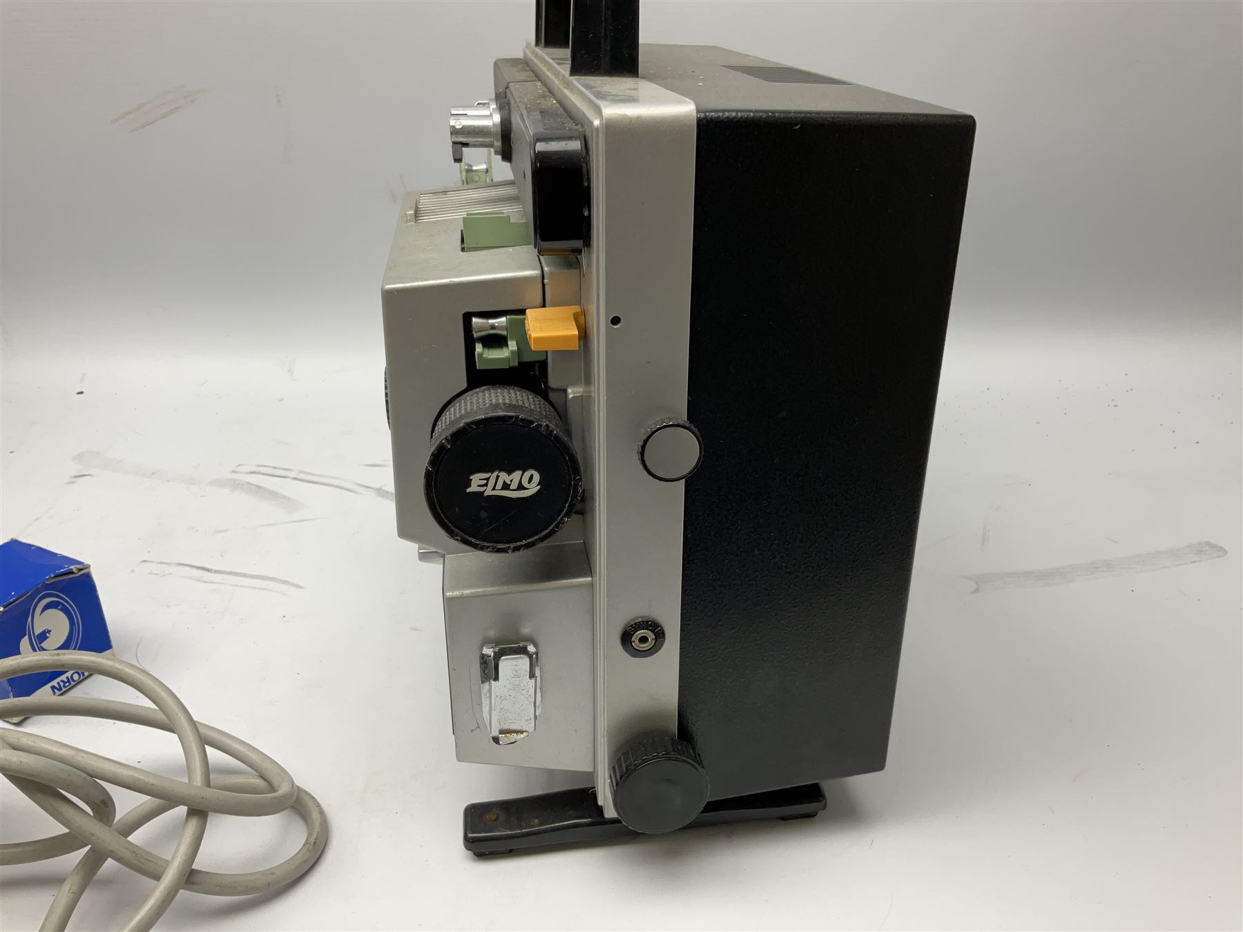 Elmo ST-1200 sound film projector, with instruction manual and black carrying case