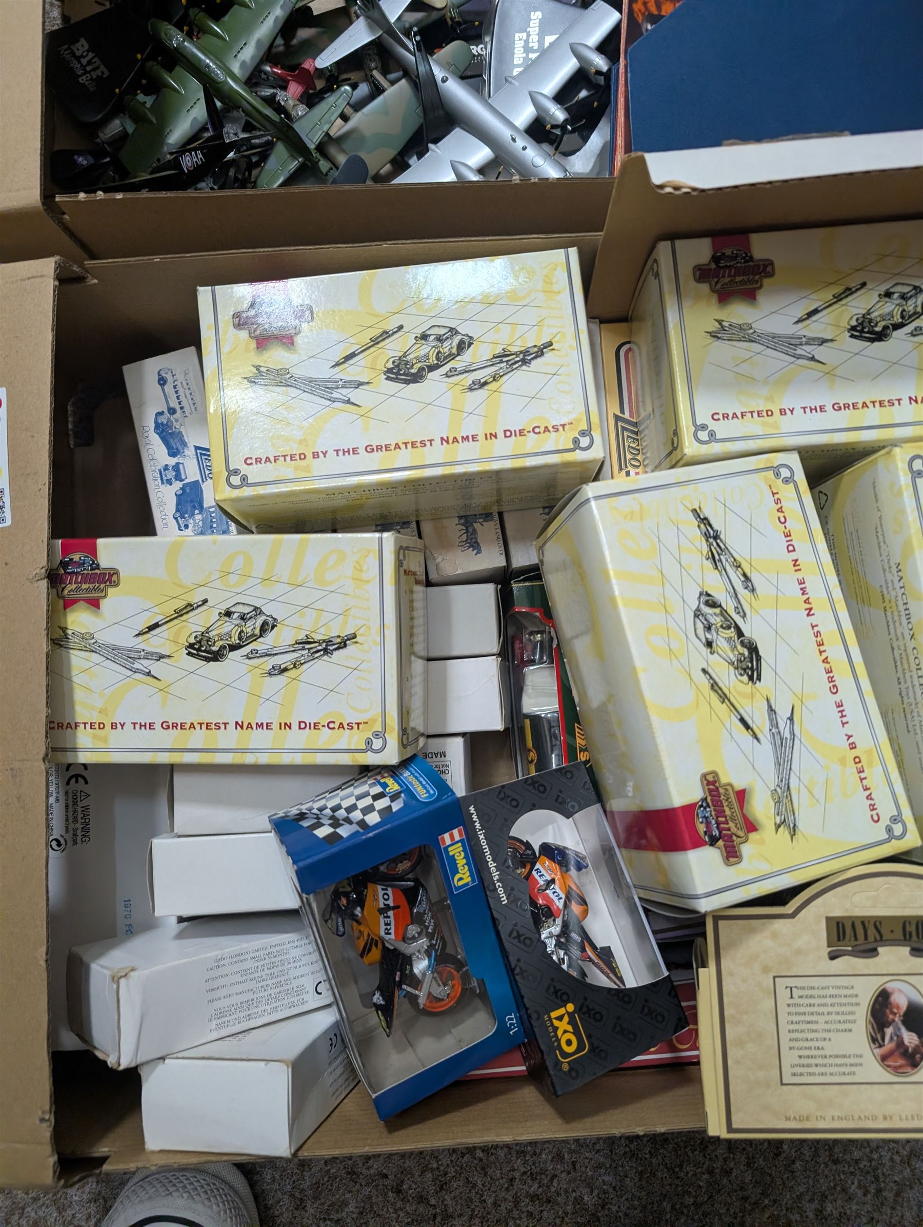 Collection of diecast model vehicles, including Corgi, Lledo and Matchbox, Atlas Editions aeroplanes and Britains soldiers, in four boxes