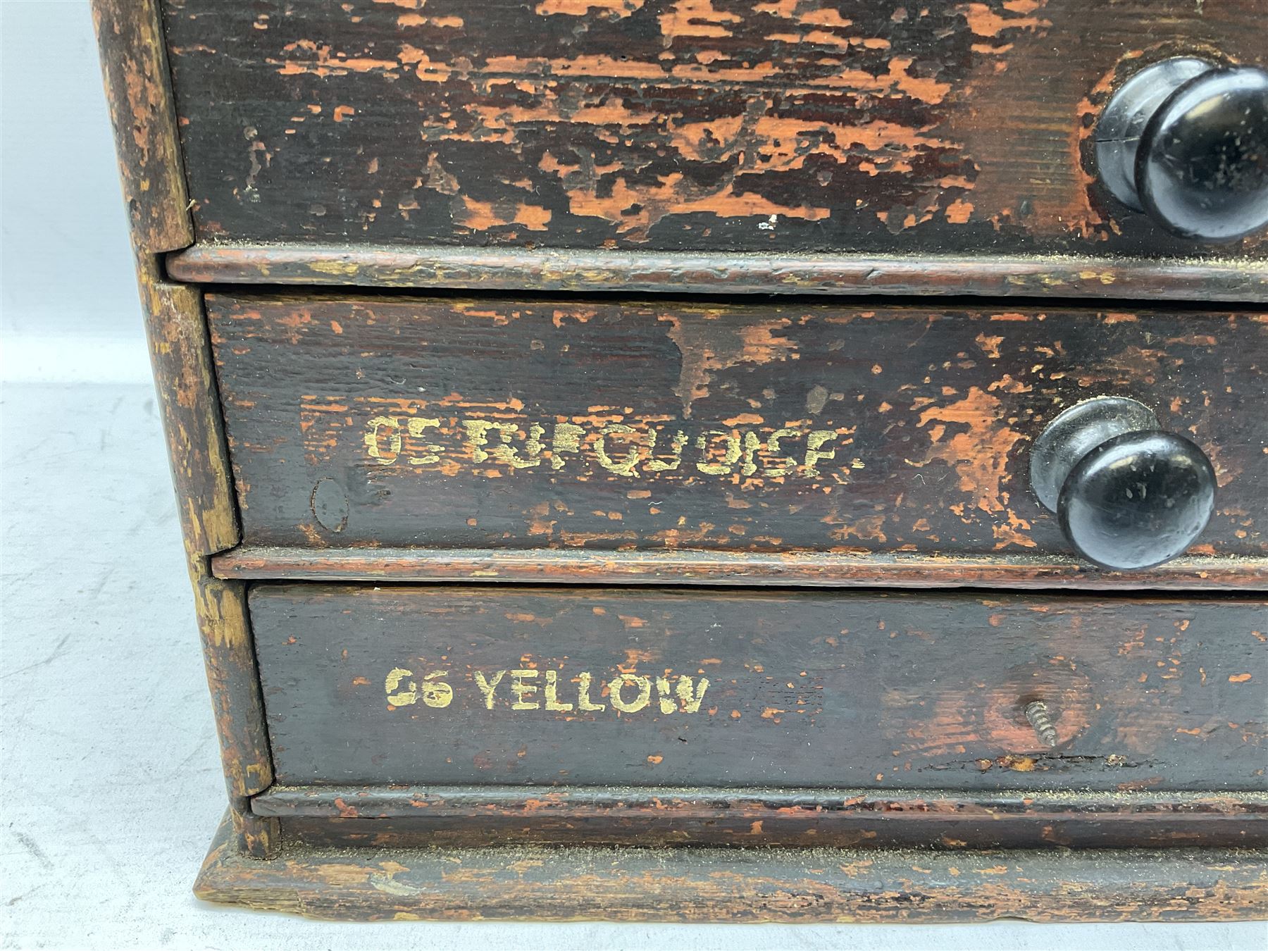 Early 20th Century Dewhurst table top chest, decorated with gilded 'Dewhurst's Sylko Machine Twist Strong Lustrous' lettering above six long drawers with names and numbers of cotton also detailed in gilt, H39cm