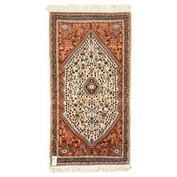 Persian design wool rug, 'Tarange-Lachak' medallion and corner design on a white and pink ...