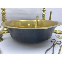 Collection of early 20th century and later brass, to include a large bowl with punched decoration to rim, pair of candlesticks, inkwell, weights, horse brasses, etc 